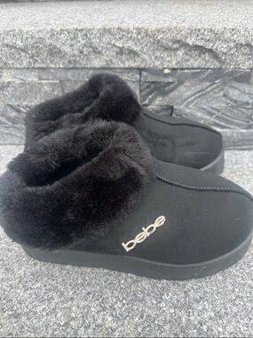 Bebe women’s boots with faux fur trim size 8